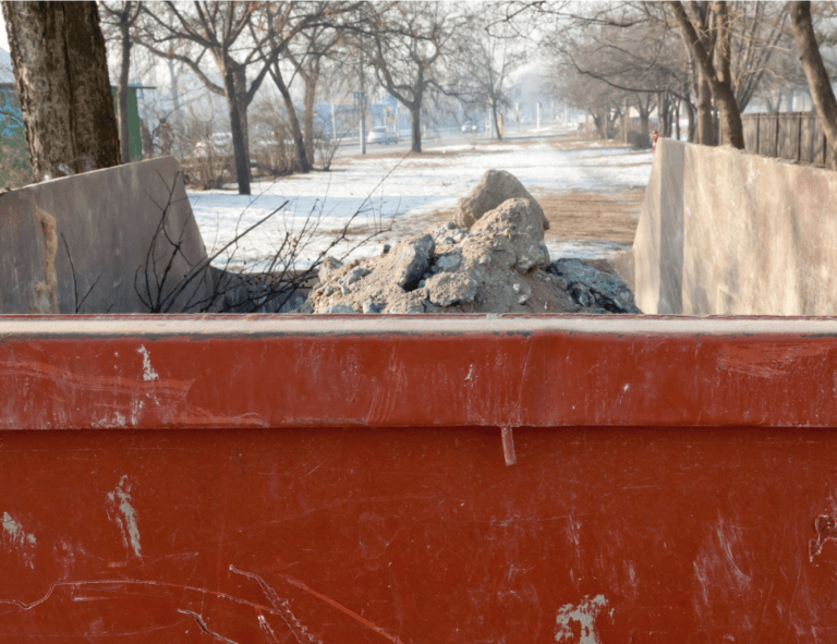 Open Top Dumpster with rock, concrete inside