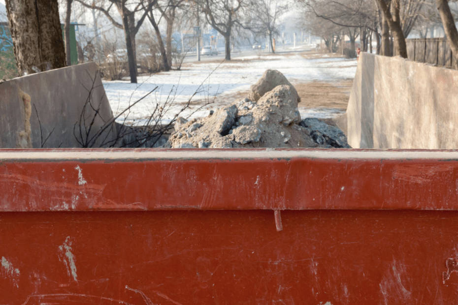 Open Top Dumpster with rock, concrete inside