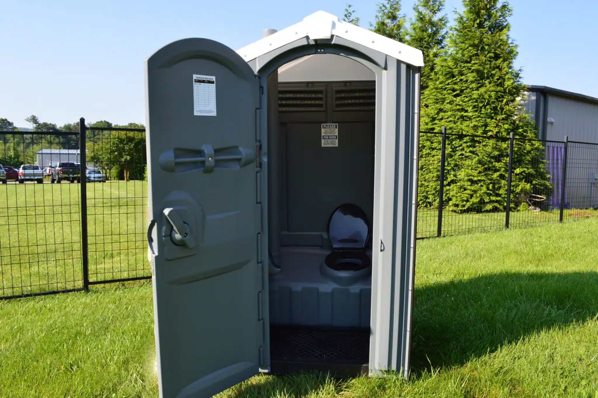 Ross waste porta potty with open door